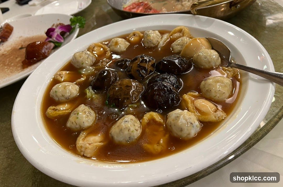 Dish with Meatballs and Mushrooms in Broth