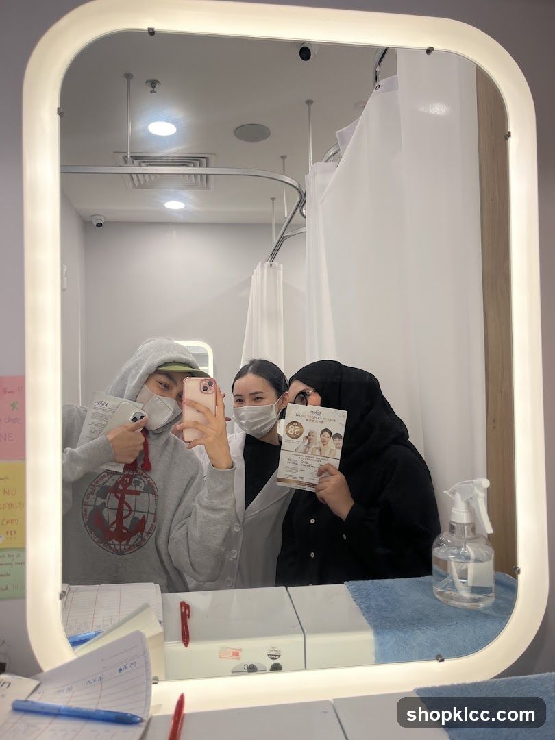 Mirror selfie in a medical or spa room