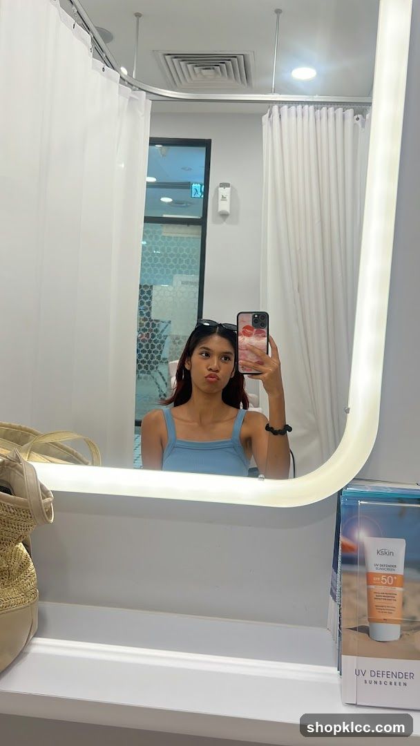 Mirror selfie in a bathroom or spa area
