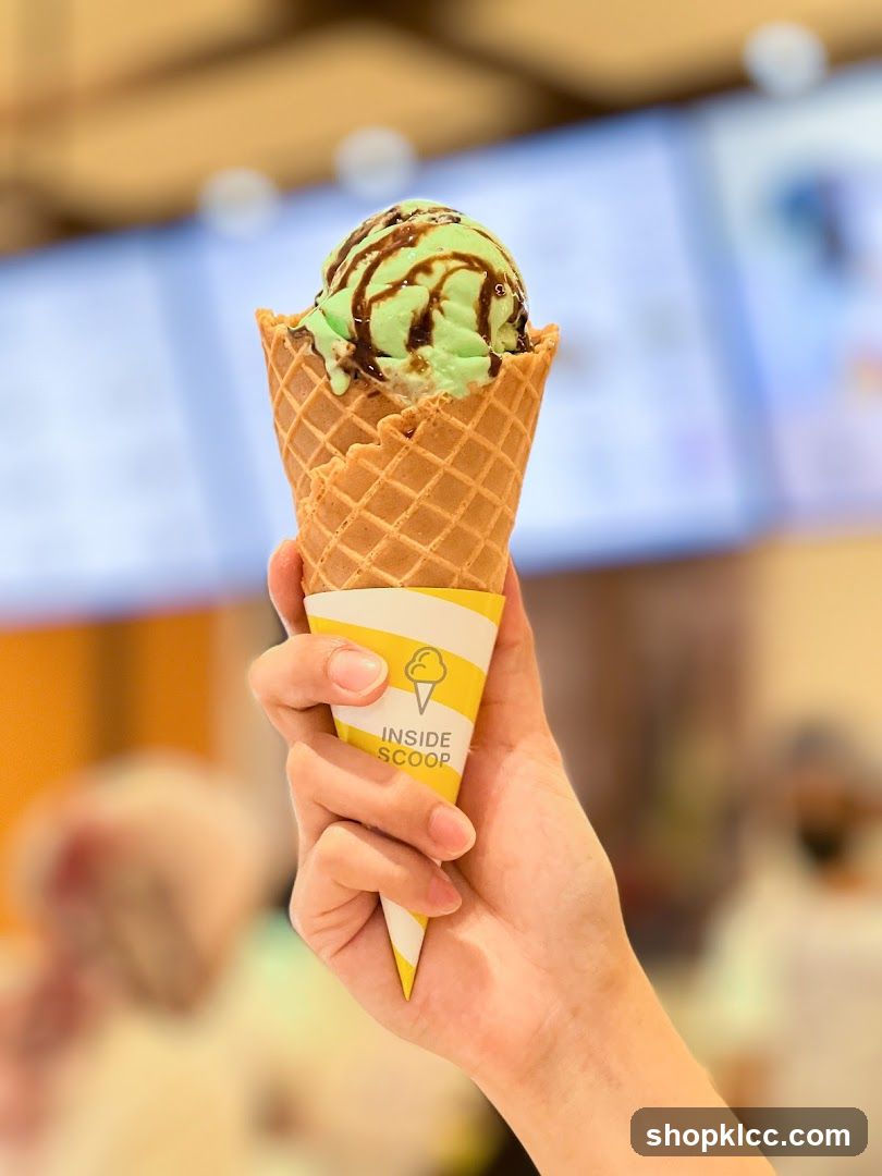 Ice Cream Cone with Green and Chocolate Flavors