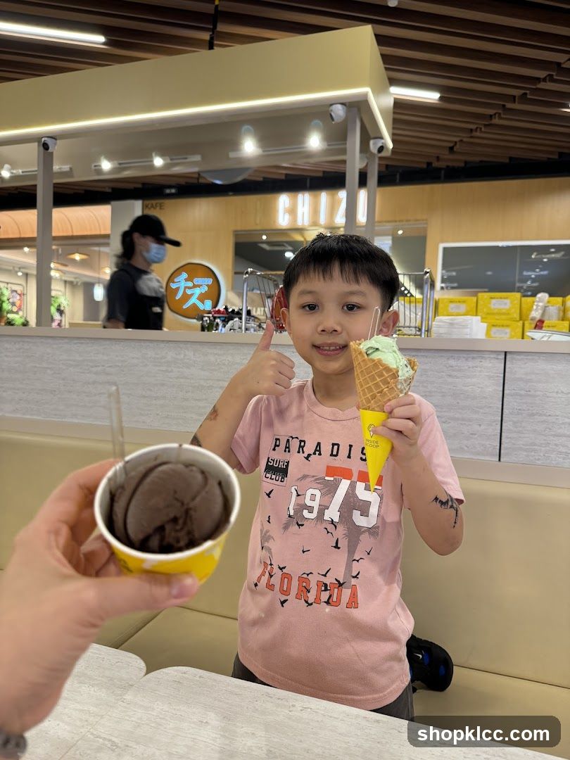 Child with Ice Cream in Mall Food Court