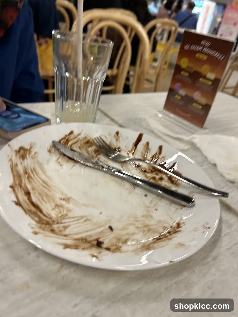 Empty Plate with Chocolate Stains
