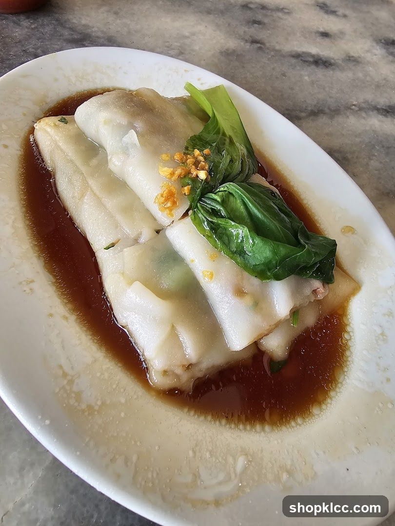 Steamed Rice Rolls with Sauce and Garnish