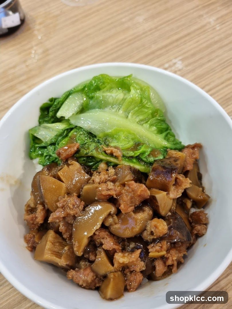 Bowl of Stir-fried Meat and Vegetables with Lettuce