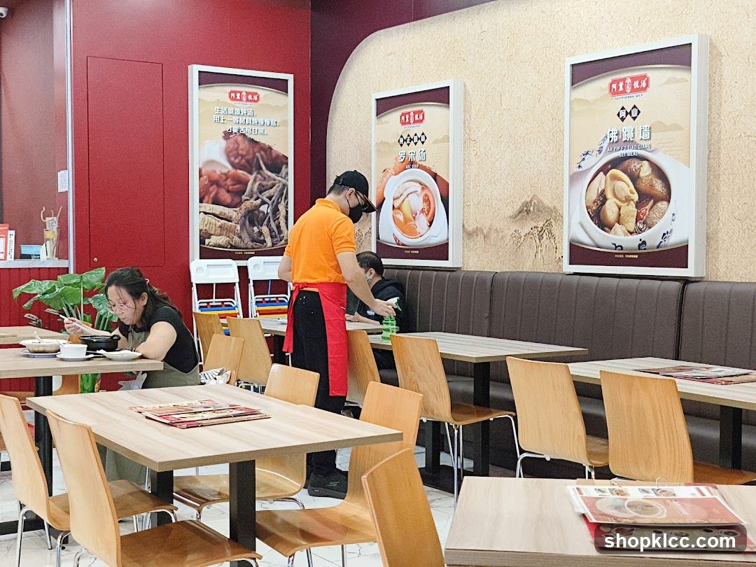 Restaurant Interior with Staff and Customers
