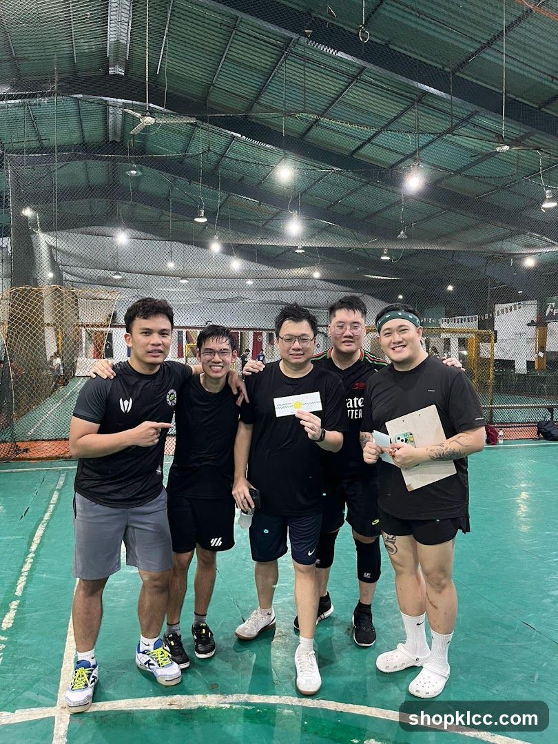 Group of men in sports gear holding certificates and a clipboard