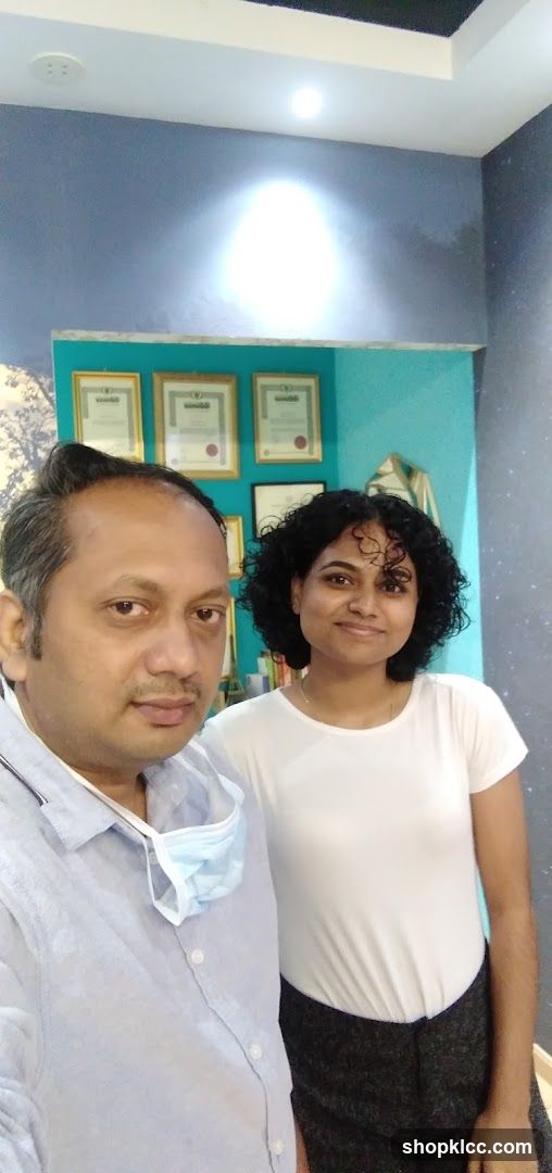 Interior photo with two people standing in a room