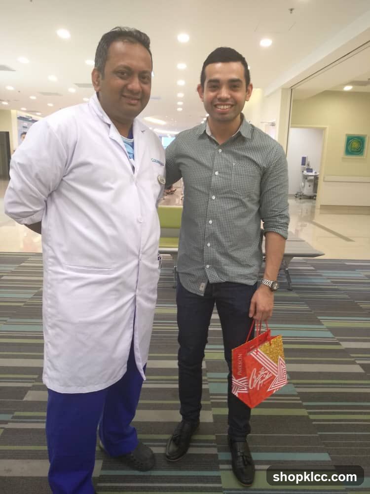 Doctor and Patient in Hospital Corridor