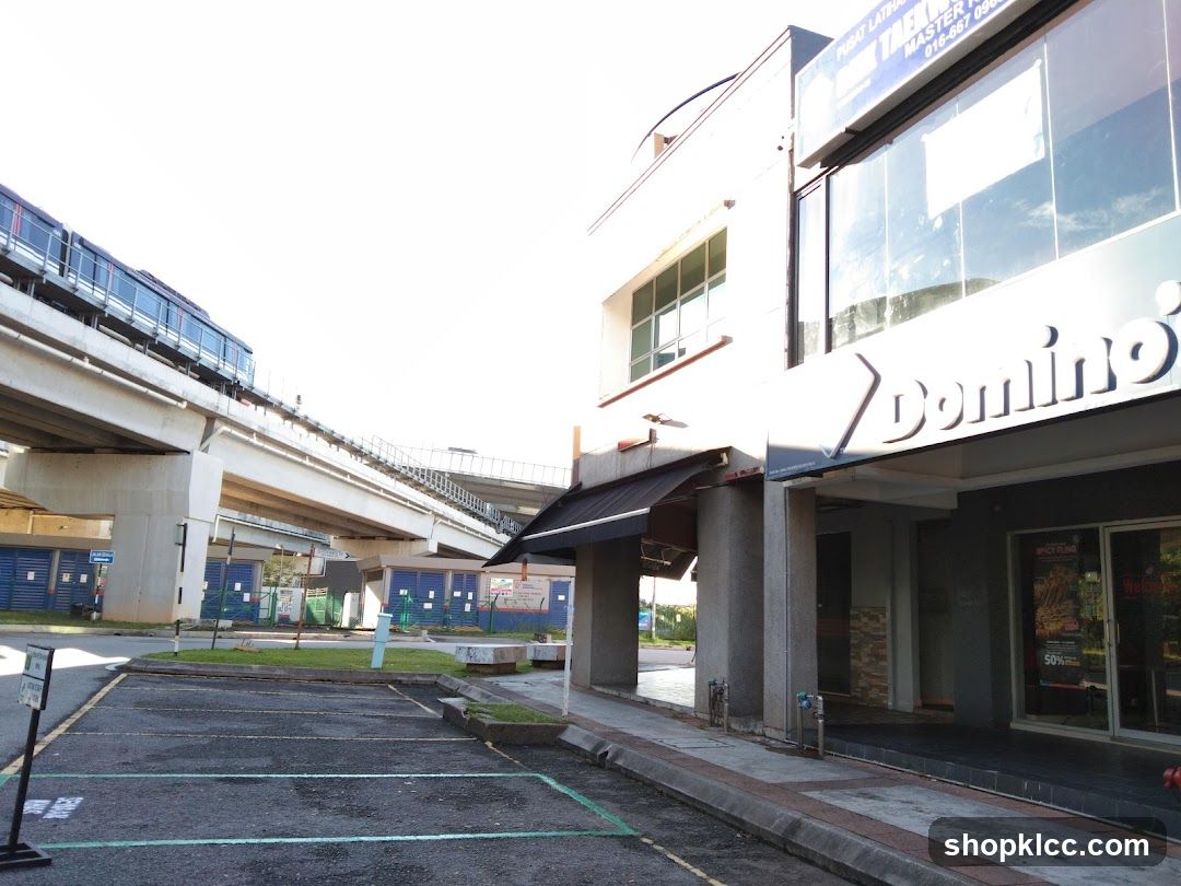 Domino's Shop Exterior with Elevated Train Track