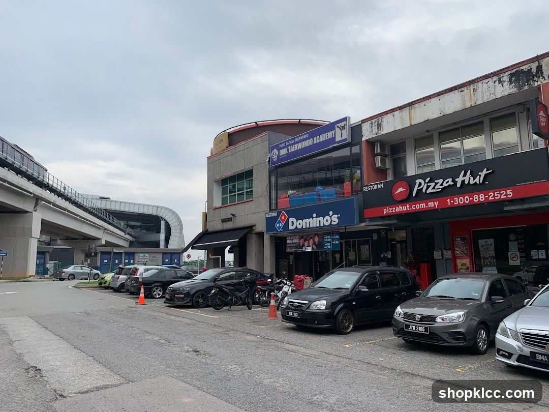 Street View with Shops and Vehicles