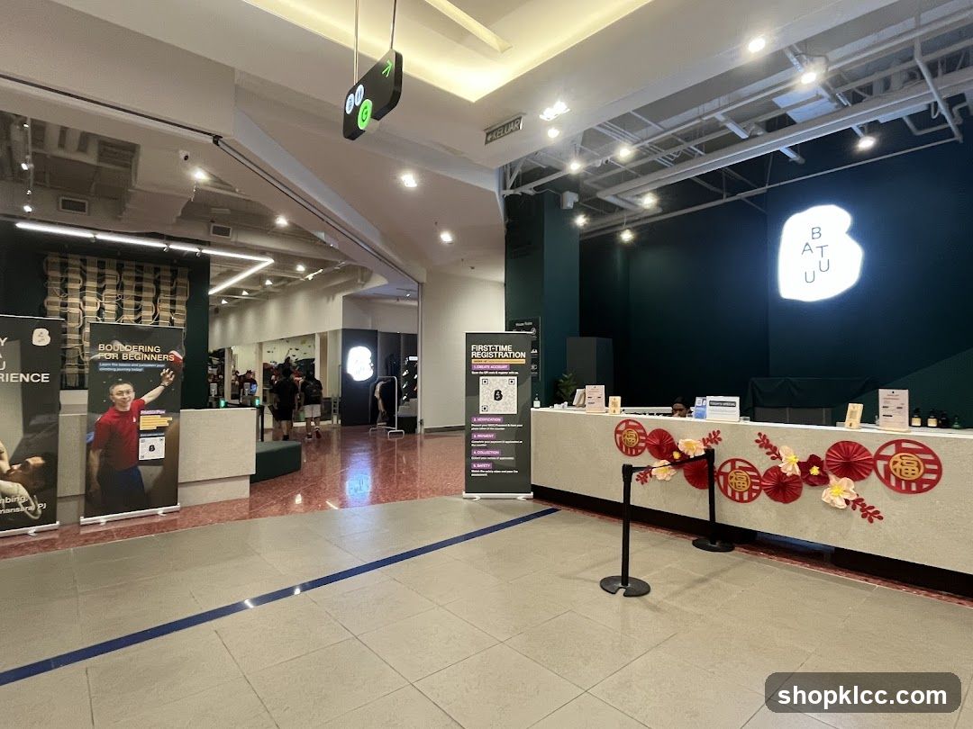 Interior of a modern commercial space with reception desk and promotional displays