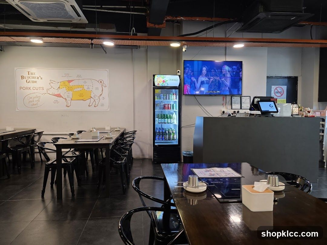 Restaurant Interior with Pork Cut Chart and TV Screen