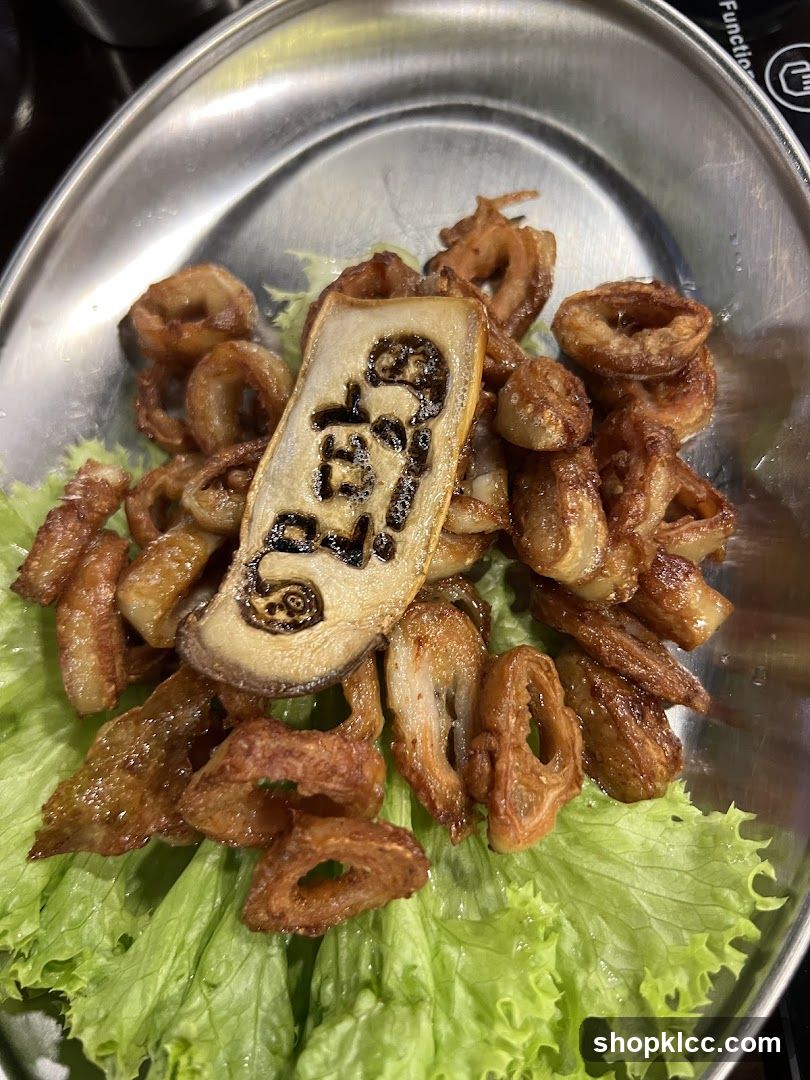 Fried Pork Rinds with Charred Sausage Slice