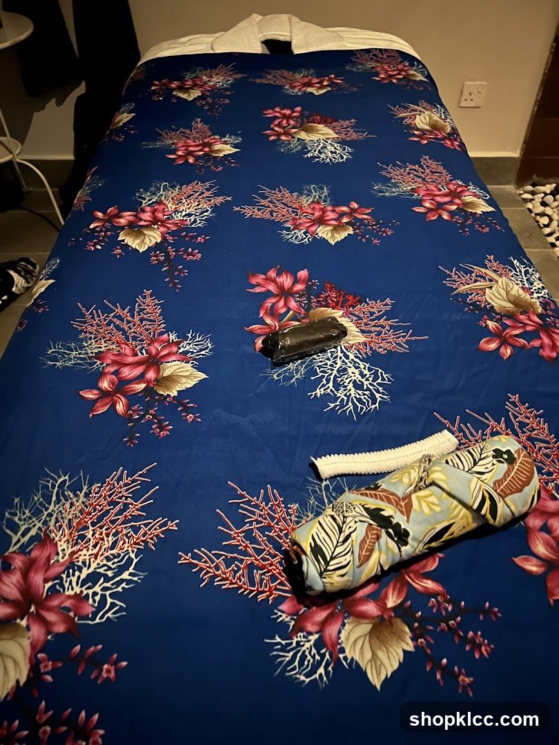 Massage Table with Floral Print Sheet