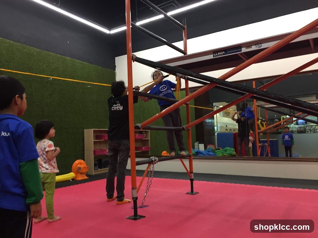 Indoor obstacle course with children and adults