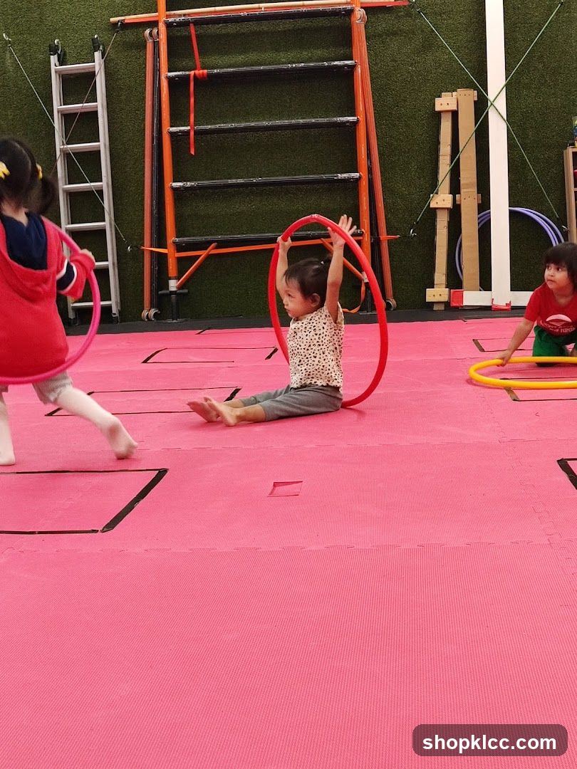 Children practicing with hoops