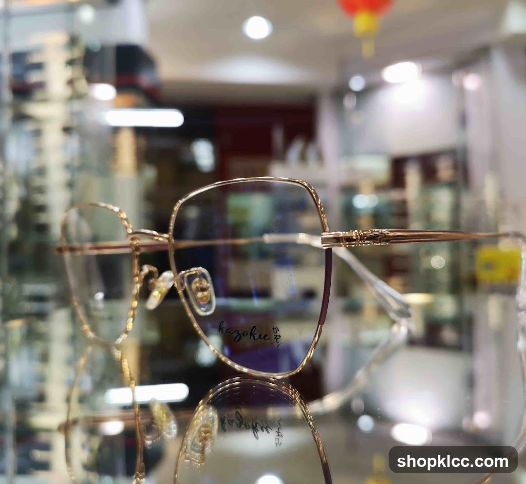Gold-rimmed eyeglasses on display