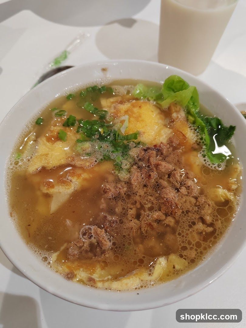 Bowl of Soup with Egg and Meat