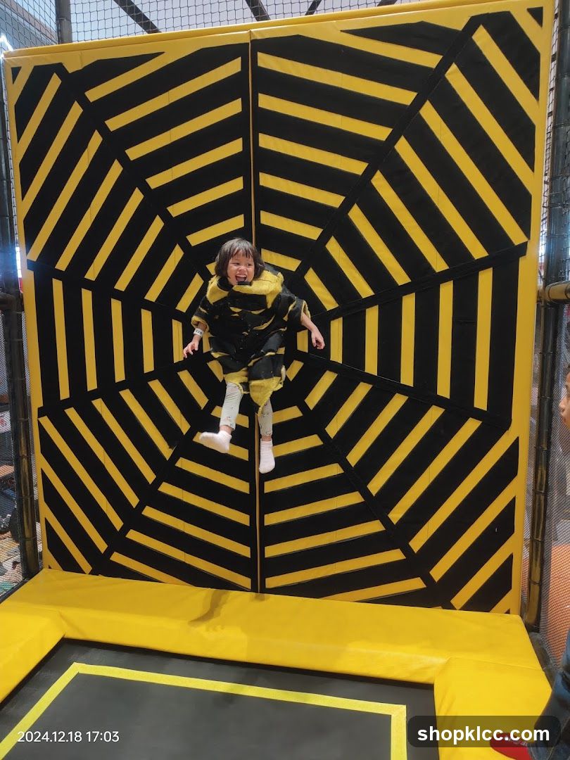 Child Jumping on Trampoline