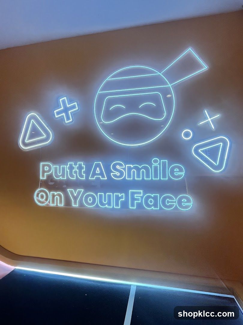 Neon Signage with Ninja and Play Button Symbols
