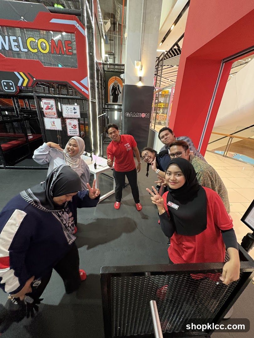 Group photo inside a gaming arcade