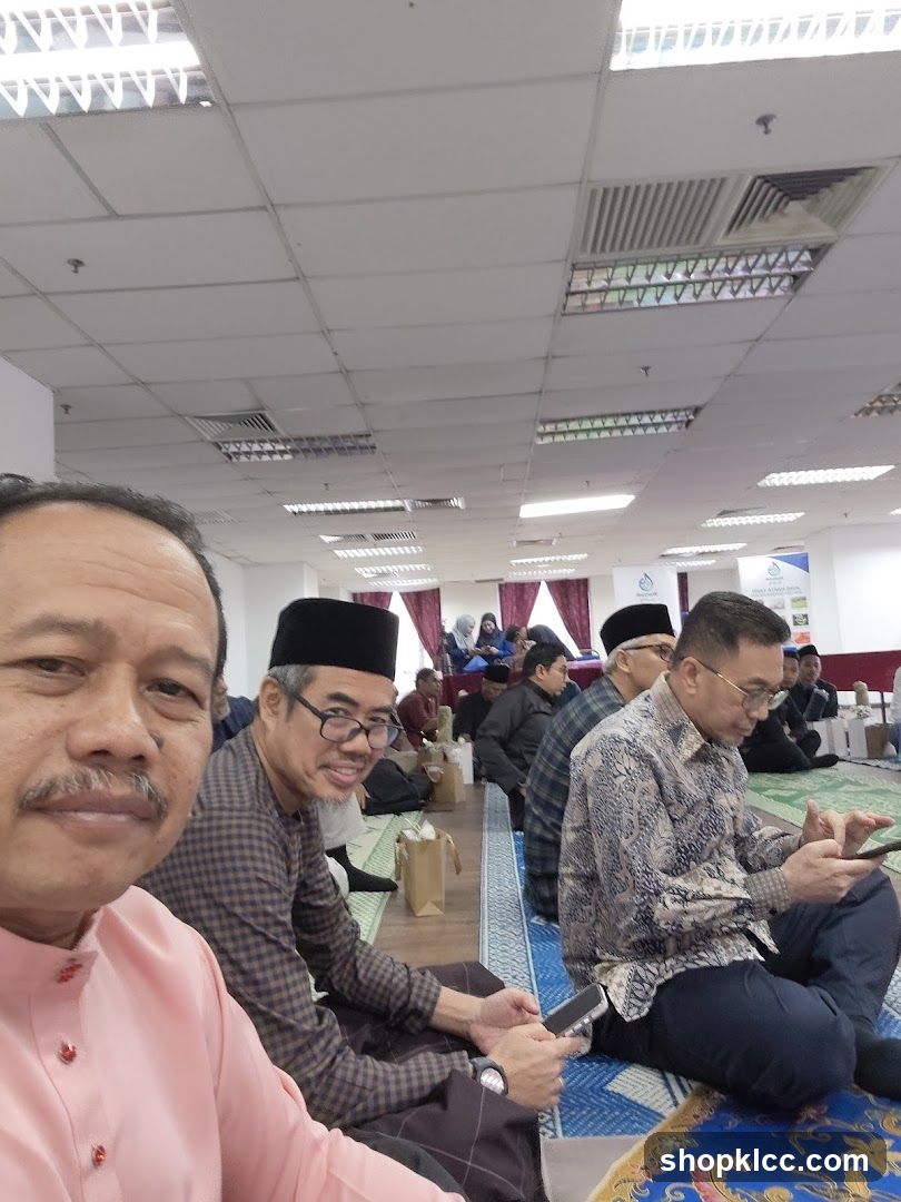 Group of men attending a meeting