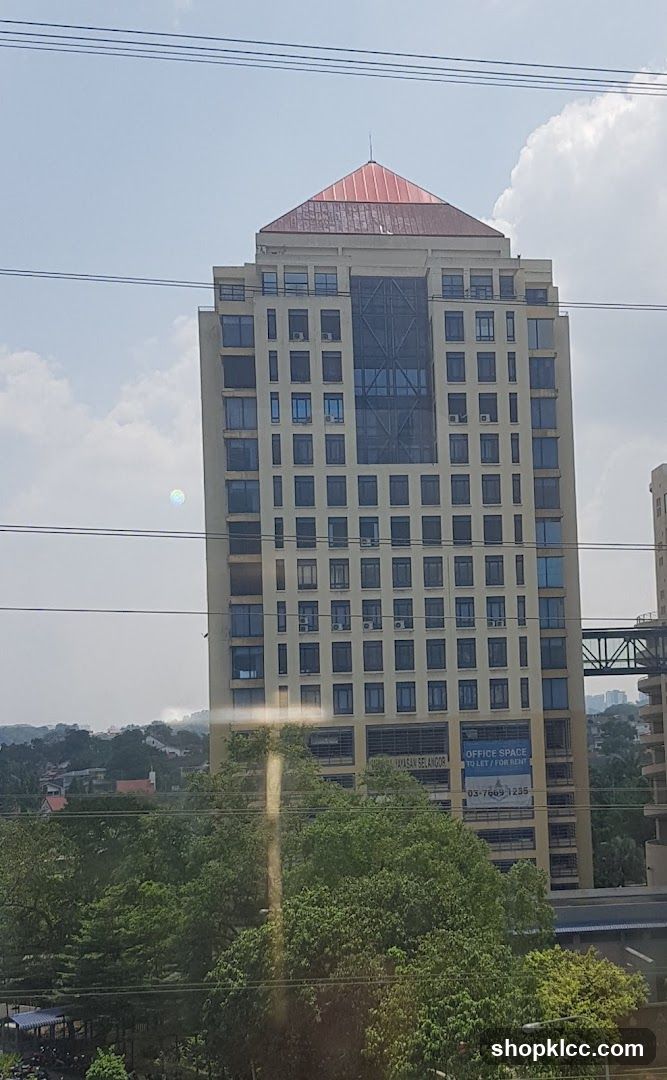 Office Building with "Office Space for Rent" Banner