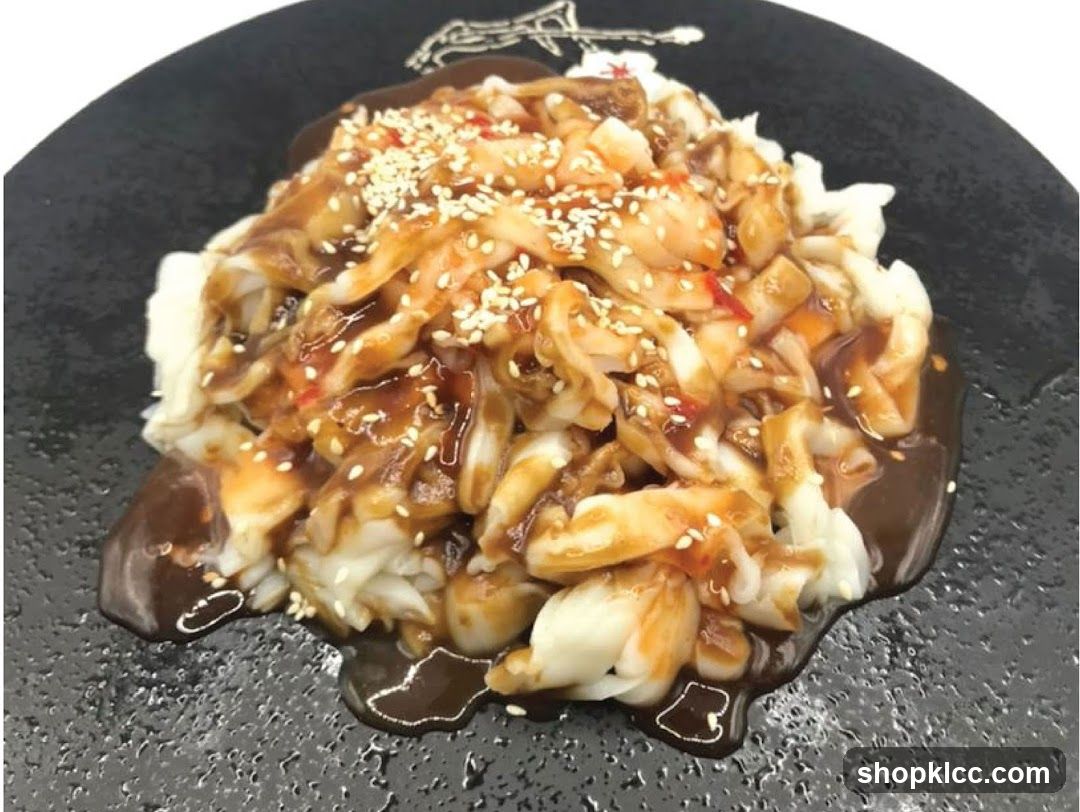 Noodle Dish with Sauce and Sesame Seeds
