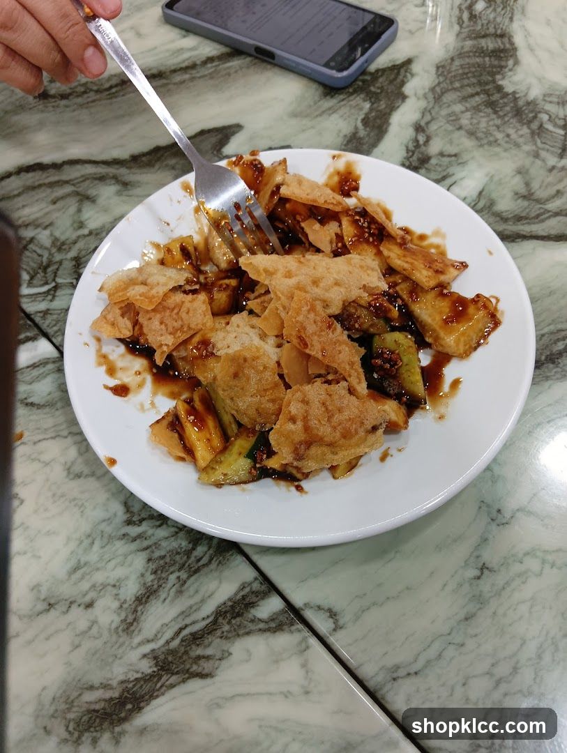 Rojak dish with fried dough and vegetables