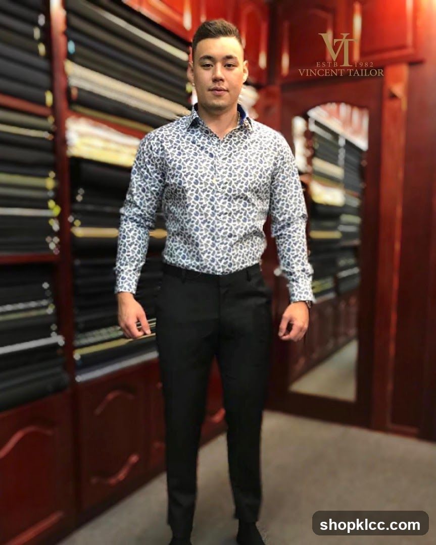 Man in a patterned shirt and black pants