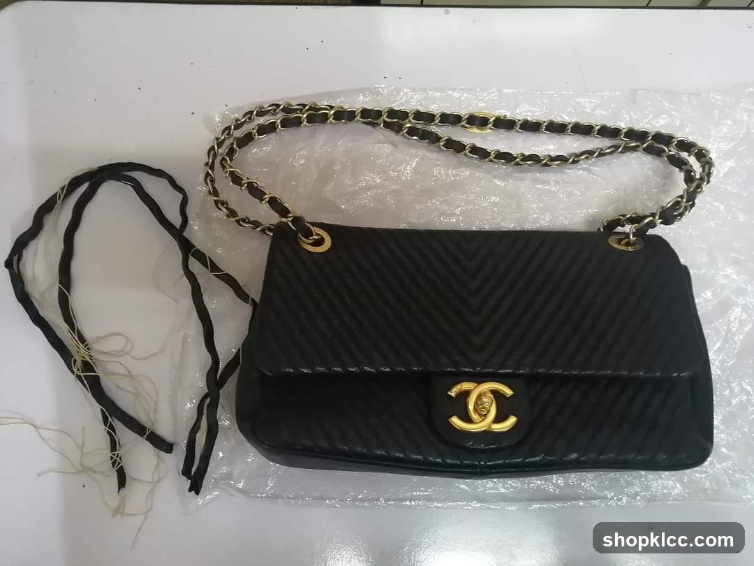 Black Quilted Handbag with Gold Chain Strap