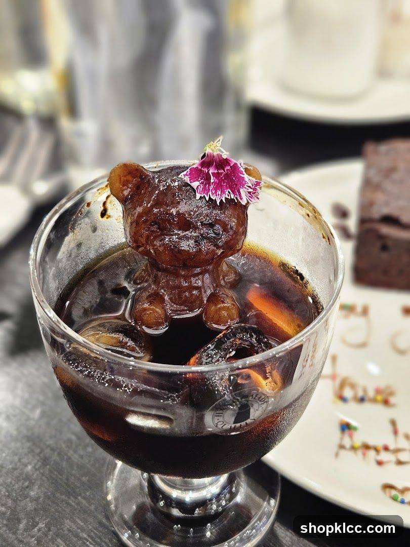 Bear-shaped ice coffee with brownie