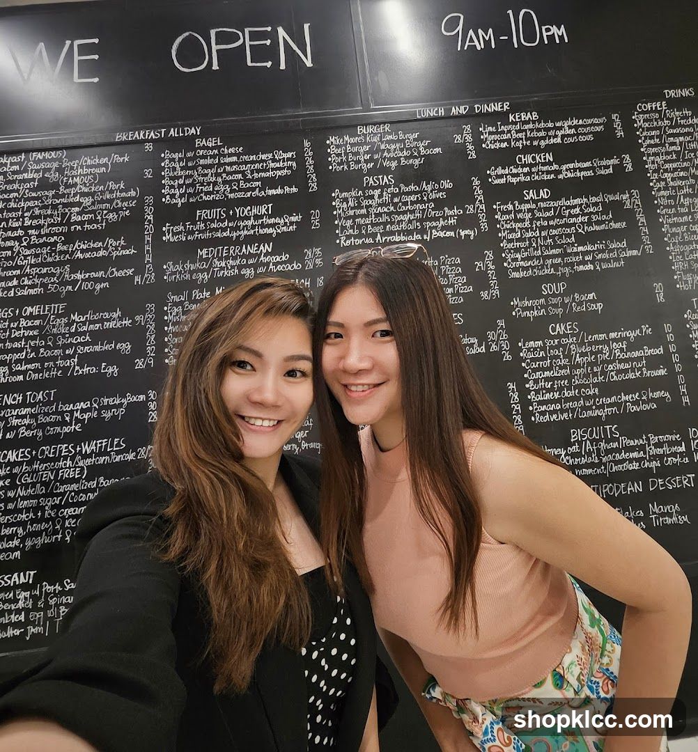 Menu Board with Two Women