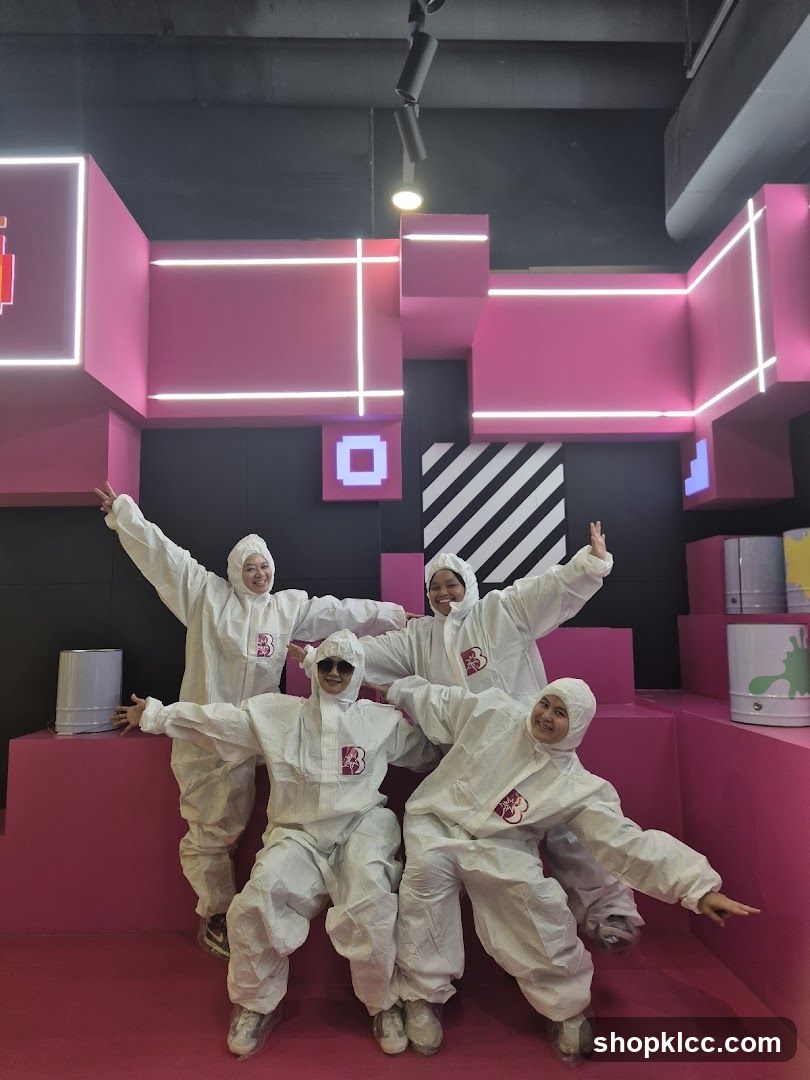 People in protective suits posing in a colorful room