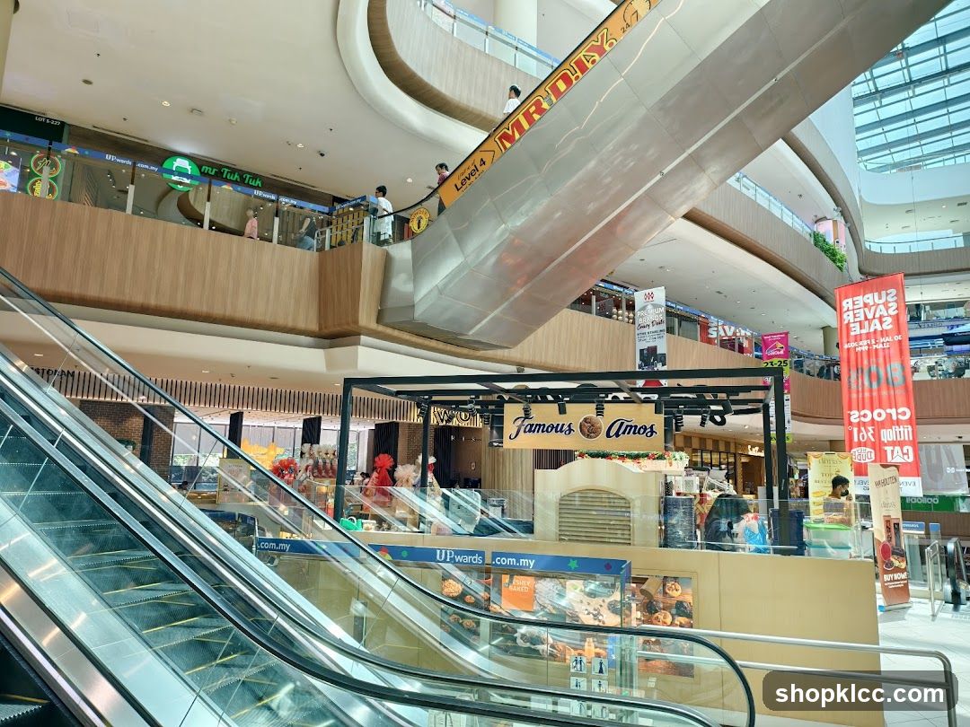 Shopping Mall Interior with Escalators and Storefronts