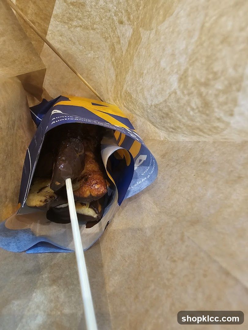 Chocolate-covered pastry in bag