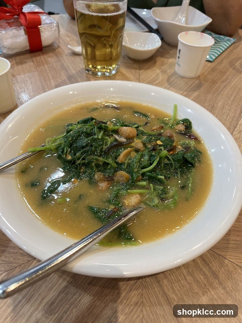 Dish with greens and broth