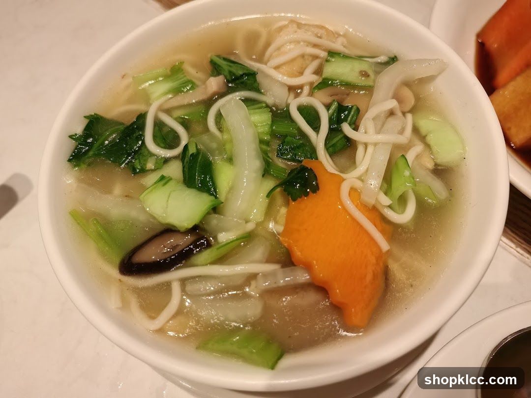 Bowl of Noodle Soup with Vegetables