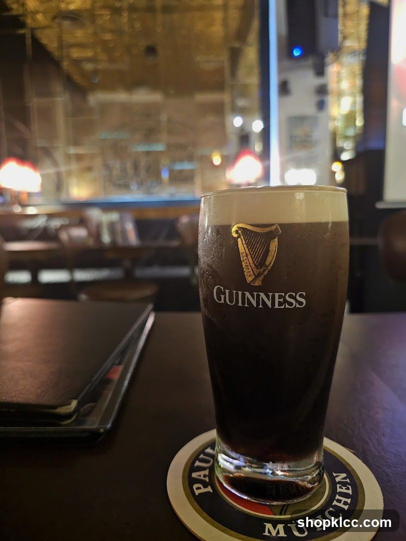 Guinness Pint in Bar Interior