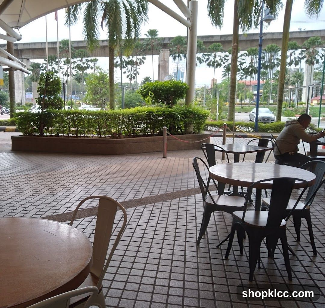 Outdoor Seating Area with Elevated Highway Background