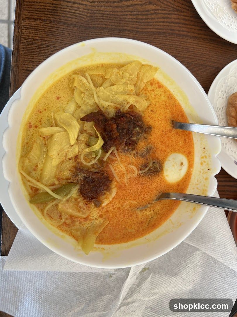 Bowl of Curry Noodles with Egg and Spices