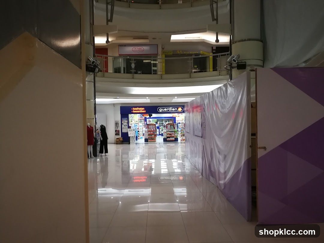 Shopping Mall Interior with Storefront and Construction Barrier