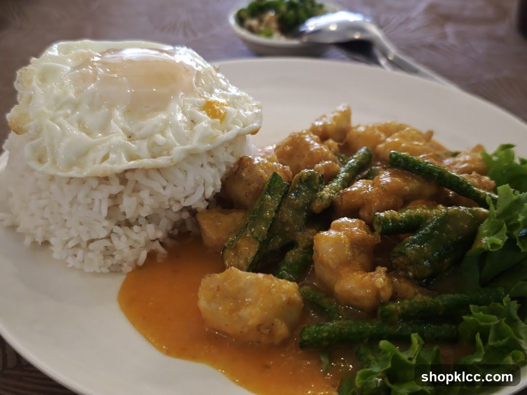Curry Dish with Rice and Fried Egg