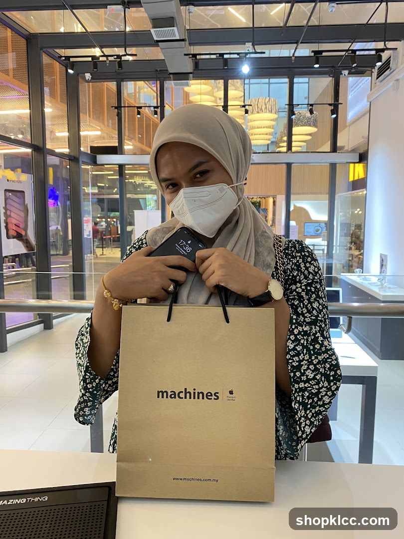Person with shopping bag in mall