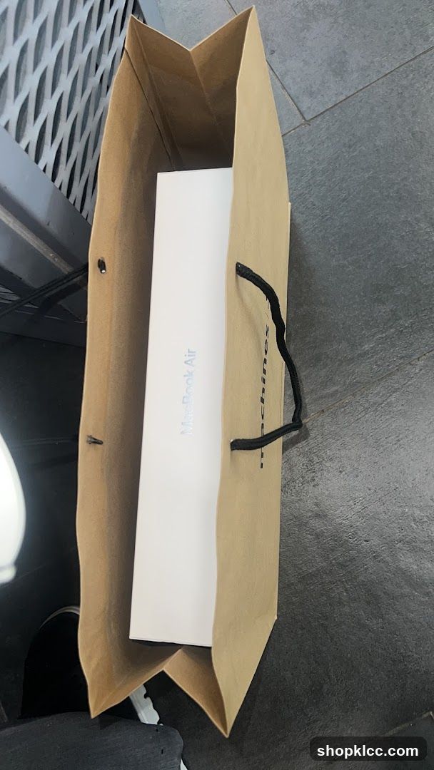MacBook Air Box in Shopping Bag