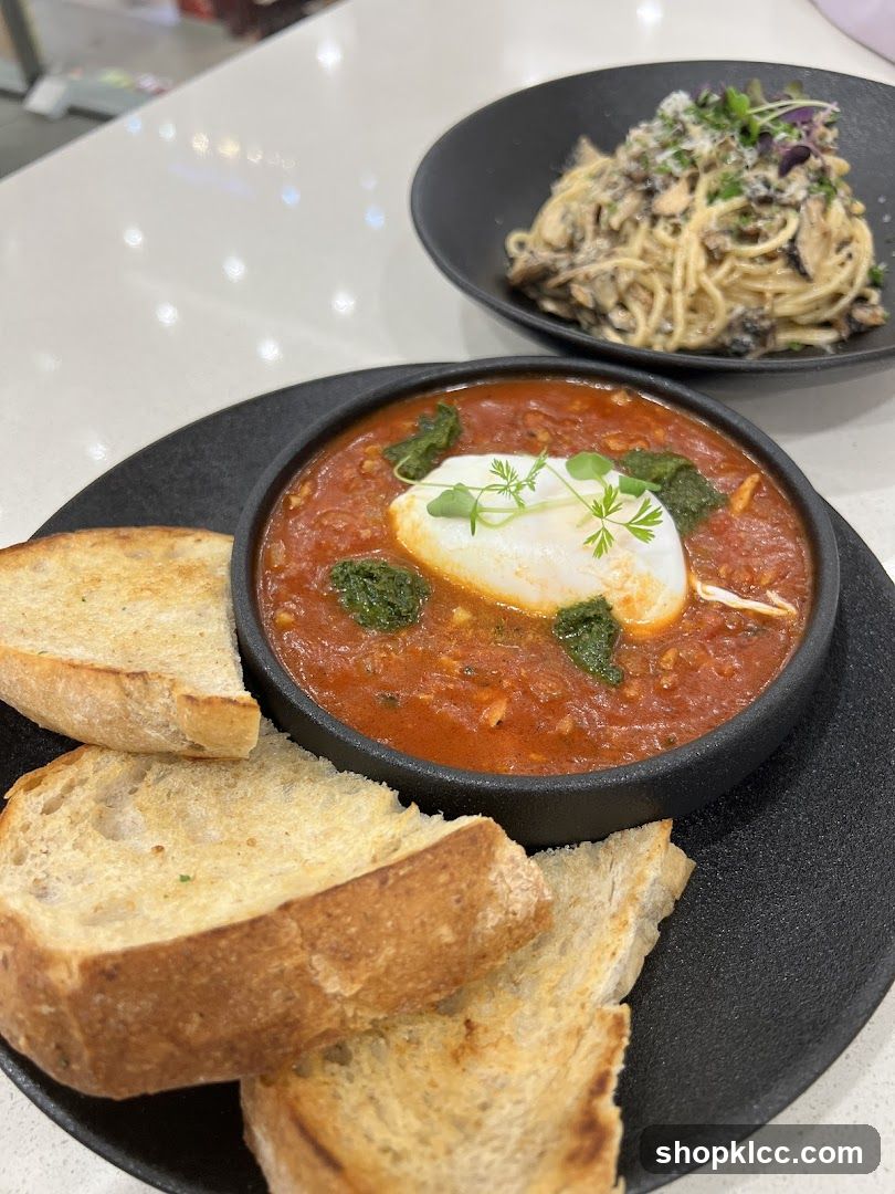 Bowl of Tomato Soup with Poached Egg and Toast