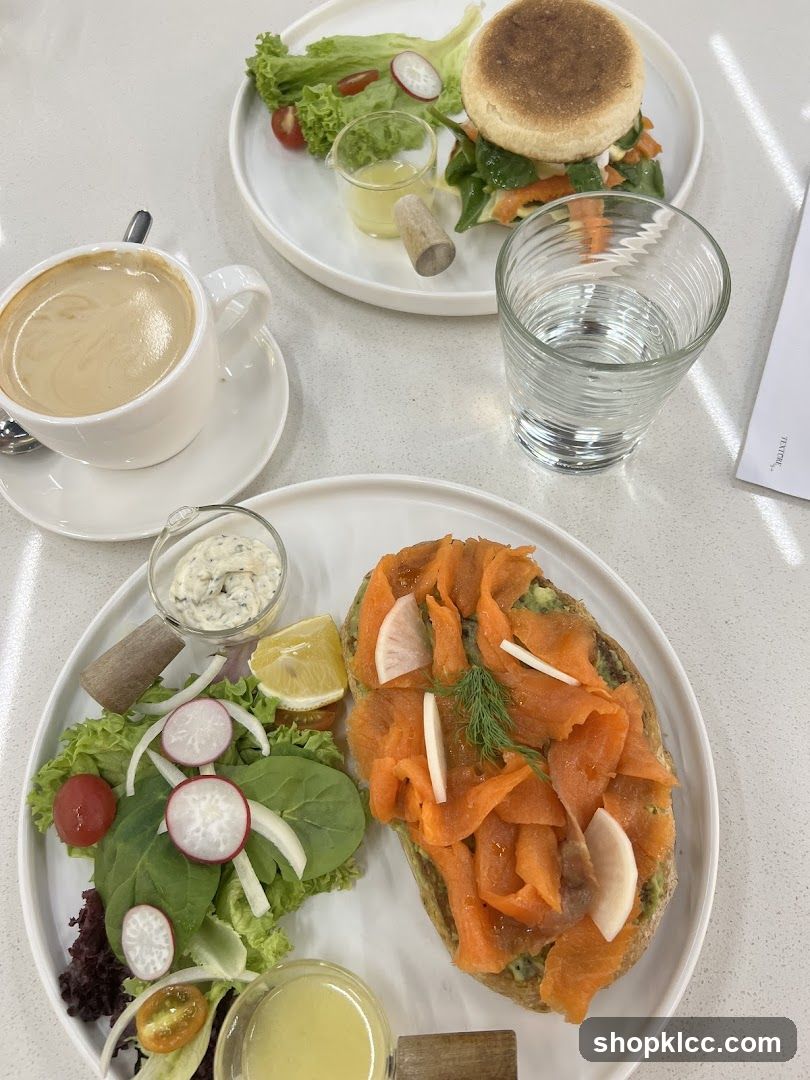 Breakfast Spread with Smoked Salmon Toast and English Muffin Sandwich