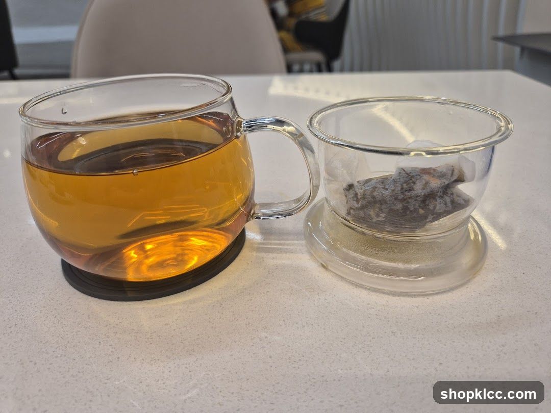 Tea Setup with Infused Tea and Tea Bag