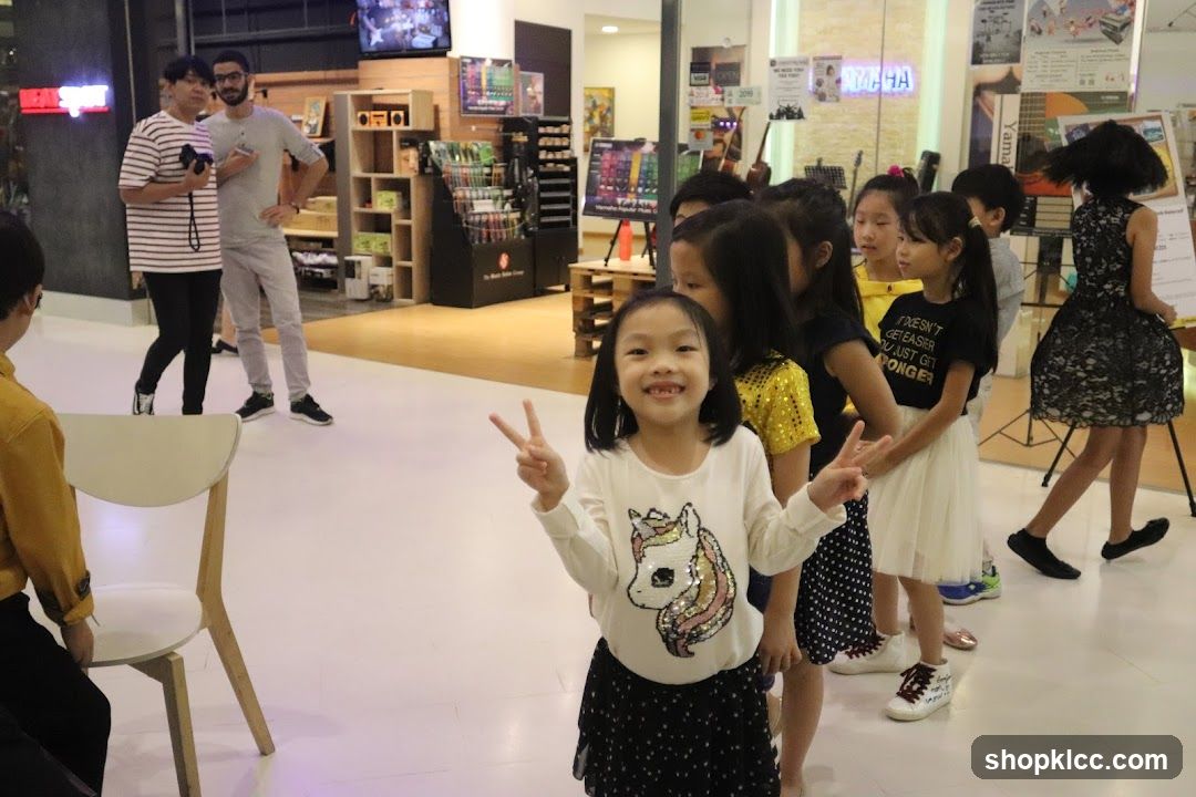Children's Group Activity in Mall Interior