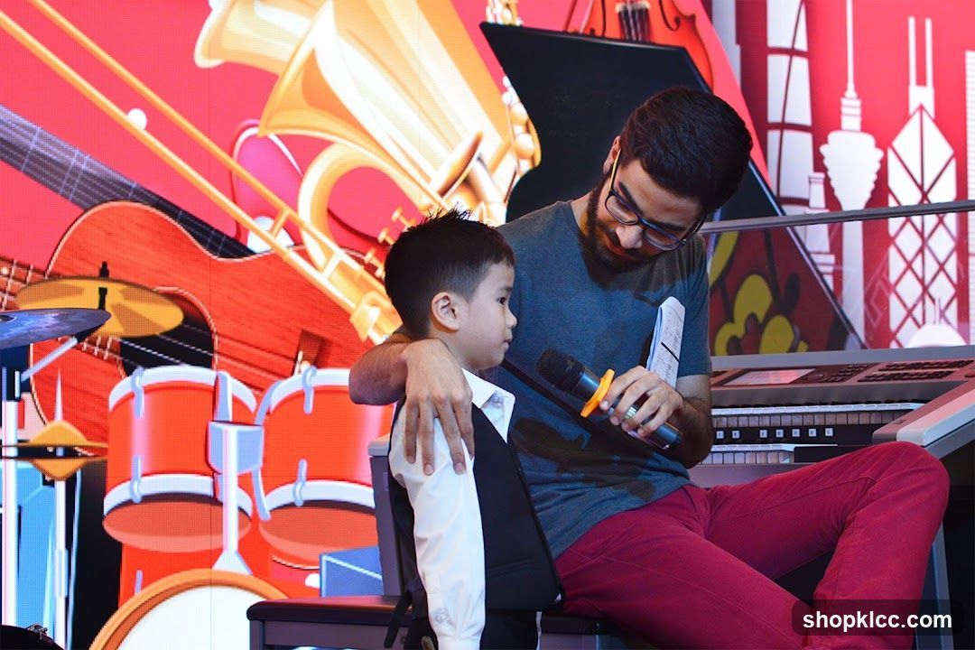 Music Performance with Young Boy and Musician